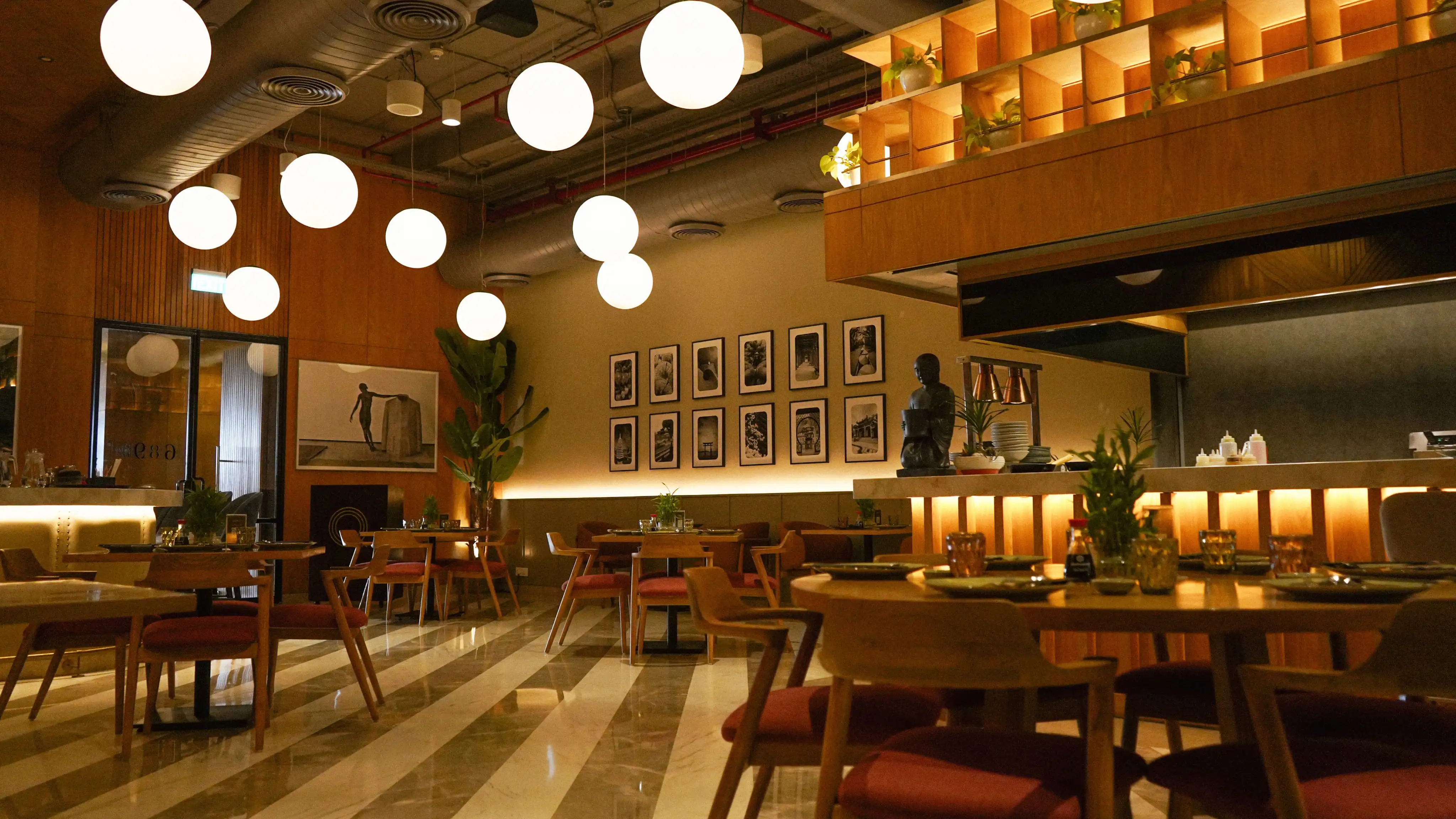Restaurant interior with a dramatic red arched doorway